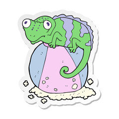 sticker of a cartoon chameleon on ball