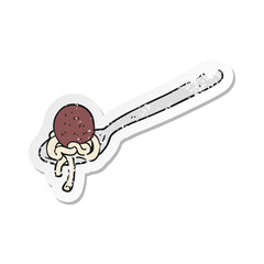 retro distressed sticker of a cartoon meatball