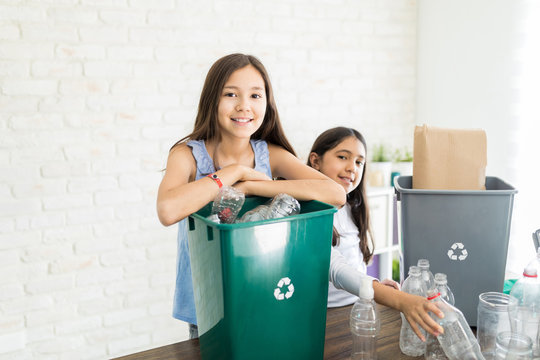 Children Recycling At Home