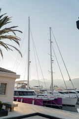 Yachts in the harbor in the resort European city looks into the distance.