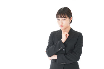 悩むビジネスウーマン