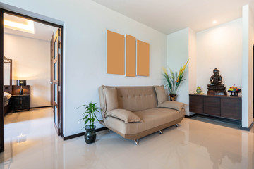 interior design ,sofa and sitting area in living room which is placed in front of master bedroom