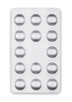 Medicine Pills in a silver blister pack on white