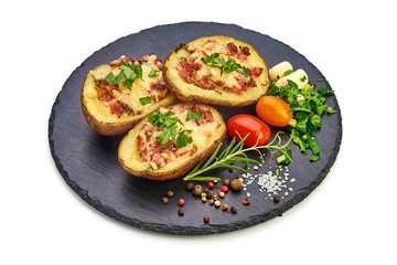 Delicious stuffed potatoes with cheese and bacon, close-up, isolated on white background