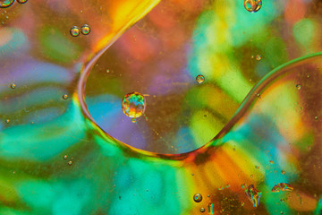 abstract background of stains and paint bubbles in liquid