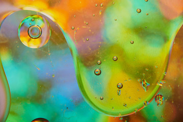 abstract background of colored drops of water and oil