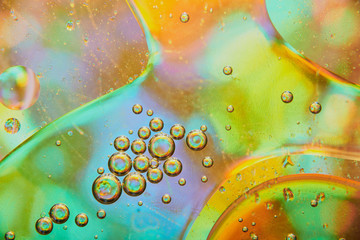 abstract background of stains and paint bubbles in liquid