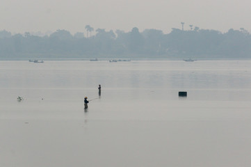 Life of fisherman at river side in Mandalay, Myanmar