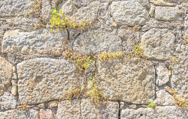 Old masonry stonewall pattern.
