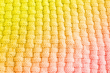 Colorful knitted background with place for text. Texture knitted.