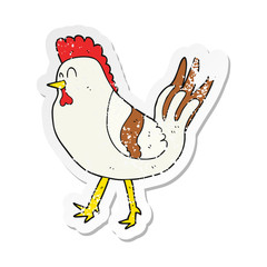 retro distressed sticker of a cartoon chicken