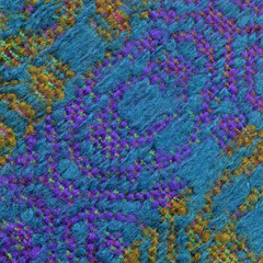 Fototapeta na wymiar Detail of handwoven woolen fabric in purple, yellow and blue