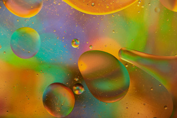 abstract background of colored drops of water and oil