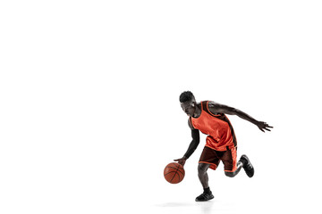 Full length portrait of a basketball player with a ball isolated on white studio background. advertising concept. Fit african anerican athlete with ball. Motion, activity, movement concepts. - Powered by Adobe