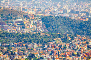 Aerial view of Barcelona with park and houses