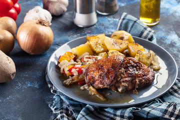 Roasted chicken thighs with potatoes