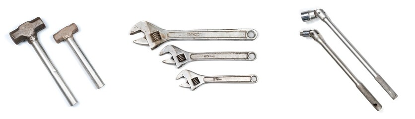Set of various metal heavy duty industrial hand tools on a isolated white background - mallet hammer adjustable wrench and ratcheting socket wrench ratchet equipment - Powered by Adobe
