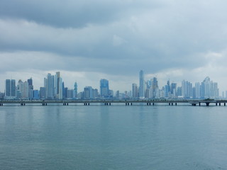 Fototapeta na wymiar Panama city skyline in a cloudy day with the city coastal belt, Panama, Central America