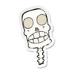 distressed sticker of a cartoon spooky skull