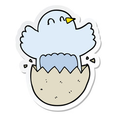 sticker of a cartoon hatching chicken