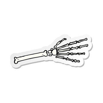 sticker of a cartoon skeleton hand