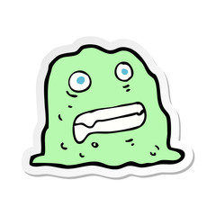 sticker of a cartoon slime creature