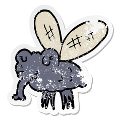 distressed sticker of a cartoon fly
