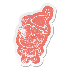 cartoon distressed sticker of a annoyed man wearing santa hat