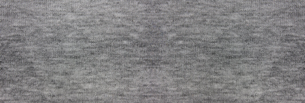 Grey fabric elingated texture background. Casual gray cloth wide image with blank copy space for text