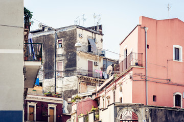 Beautiful cityscape of Italy, historical street of Catania, Sicily, facade of old buildings.