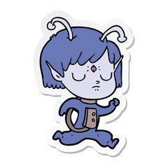 sticker of a cartoon alien girl
