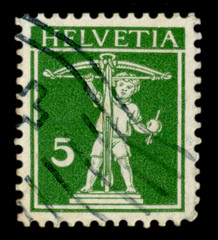 Switzerland - 13 Nov 1914: Swiss historical stamp: Son of William tell with a crossbow, an Apple with an arrow, Helvetia postmark cancellation,  world war one 1914. Switzerland
