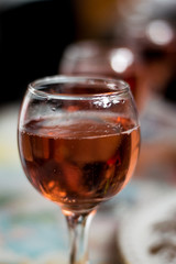 A glass with red vermouth on the holiday table
