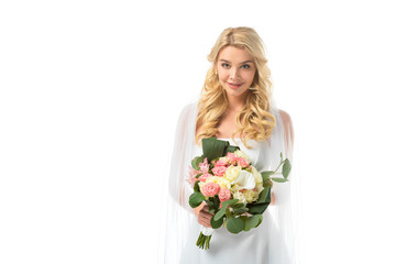 charming bride holding beautiful wedding bouquet and looking at camera isolated on white
