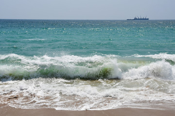 India, Kerala. Beach of the Indian ocean in sunny day