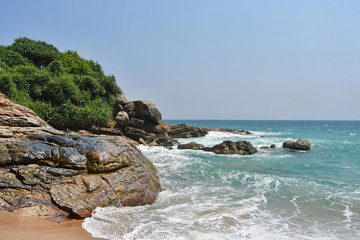 Fototapeta na wymiar India, Kerala. Beach of the Indian ocean in sunny day