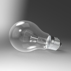 Incandescent light bulb isolated lies on gray background. 3D render