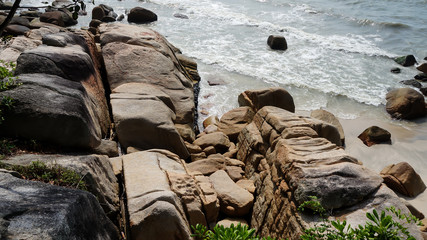 Beautiful seascape of rock and wave near Teluk Chempedak