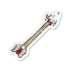 distressed sticker of a cartoon arrow