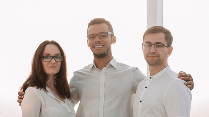 portrait of a successful young business team standing together