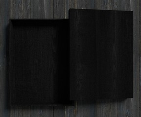 Black wood box on a timber background. 3D rendering.