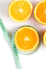 slices of fresh orange on white background