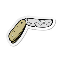 sticker of a cartoon folding knife