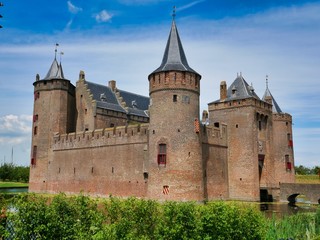 Fototapeta na wymiar Medieval Helmond castle in Netherlands during the morning at summer 