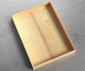 Empty wooden box template on a gray background. 3D rendering.