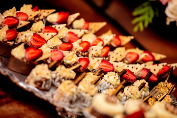 wedding candy table. delicious and assorted sweets. selective focus.