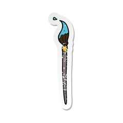 retro distressed sticker of a cartoon artists brush