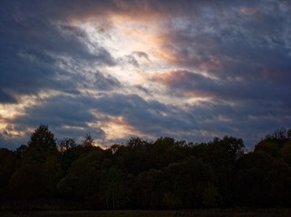 colorful sunset in the countryside in autumn