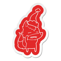 cartoon  sticker of a wolf showing teeth wearing santa hat