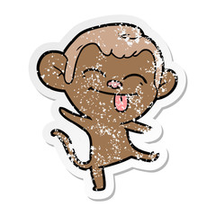 Obraz premium distressed sticker of a funny cartoon monkey dancing